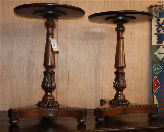 A pair of William IV circular rosewood and mahogany wine tables (altered) H.60cm